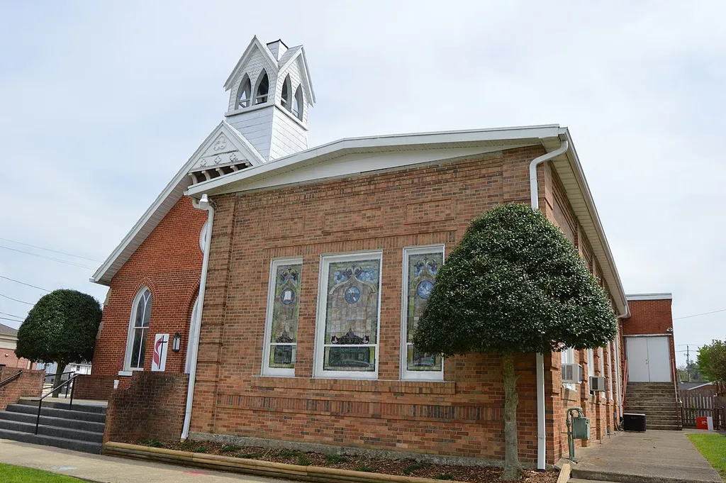 Front of the First United Methodist Church, located at 204 W. Main Street in Louisa, Kentucky, United States. Built in 1850 and later expanded, it is listed on the National Register of Historic Places, and it is part of a Register-listed historic district, the Louisa Residential Historic District.