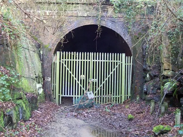 Disused tunnel at Ton-y-pistyll, Newbridge, Caerphilly. The railway between Risca in the Ebbw Valley and Markham Colliery in the Sirhowy Valley passed under the A472 (now unclassified) at Ton-y-pistyll, by means of the 239 yds-long Penar Tunnel. This is the west portal of the tunnel.