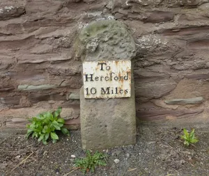 Milestone, opp. entrance to Stoke Lacy church