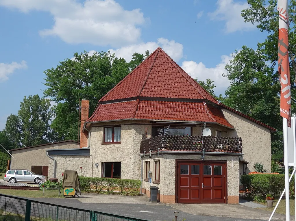 South-western view of former village church in Ravensbrück, Fürstenberg/Havel municipality, Oberhavel district, Brandenburg state, Germany. Architect:Georg Büttner