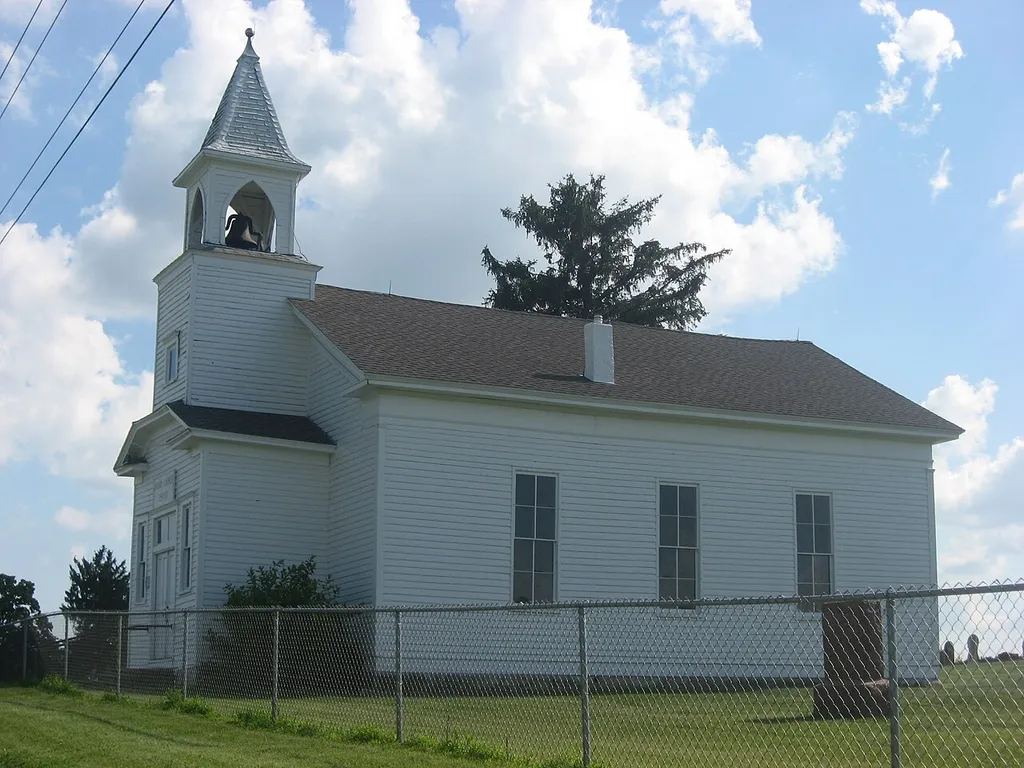 Northern side and front of the Jacoby Church, located on the western side of King Road east of Plymouth in Center Township, Marshall County, Indiana, United States. Built in 1860, it is listed on the National Register of Historic Places.