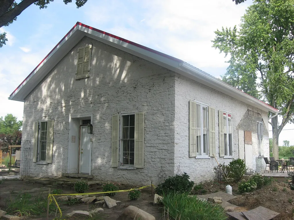 View from the southwest of the Casstown Lutheran Stone Church, located at 11 S. Main Street in Casstown, Ohio, United States. Built in 1839 and since converted into a house, it is listed on the National Register of Historic Places.