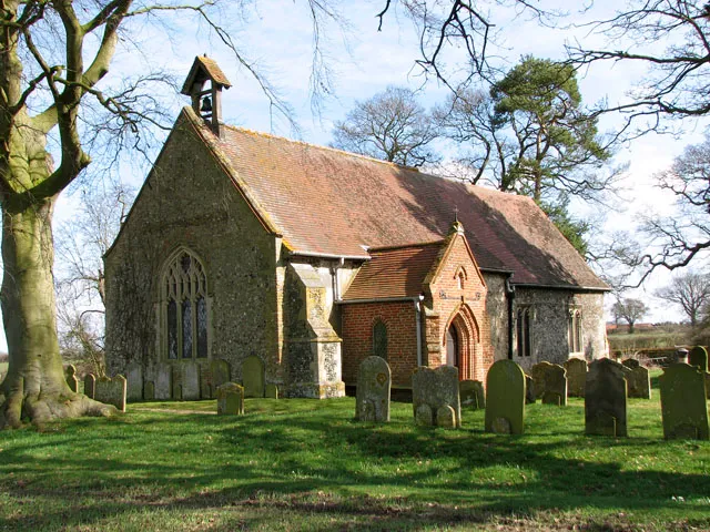The church of St Andrew, Thelveton. St Andrew's church is situated at a picturesque spot of the Thelveton Estate, bordered by fields and a cattle pasture. Boudica's Way long distance footpath > 1764759 leads past the churchyard. The building - an estate church rather than a parish church - is of Norman origins but has been extensively restored by the Mann family, Lords of the Manor, from the late 1800s onwards. The tower collapsed in 1757 and has not been replaced, the furnishings date from the C19 restoration and the marble reredos > 1764847 with mosaic inlay dates from that time. The chancel also houses a wall memorial to Thomas Mann (1886) > 1764859 which was made by C Stoatt. The Mann family owns the estate to this day. The east window > 1764855 was presented in 1899 in memory of Thomas Mann and his wife. The stained glass windows > 1764864 are of very good quality, unfortunately noboby could tell me who made them. The octagonal font > 1764872 is C15 and a large royal arms for Charles I (1620s) > 1764874 hangs above the south doorway.