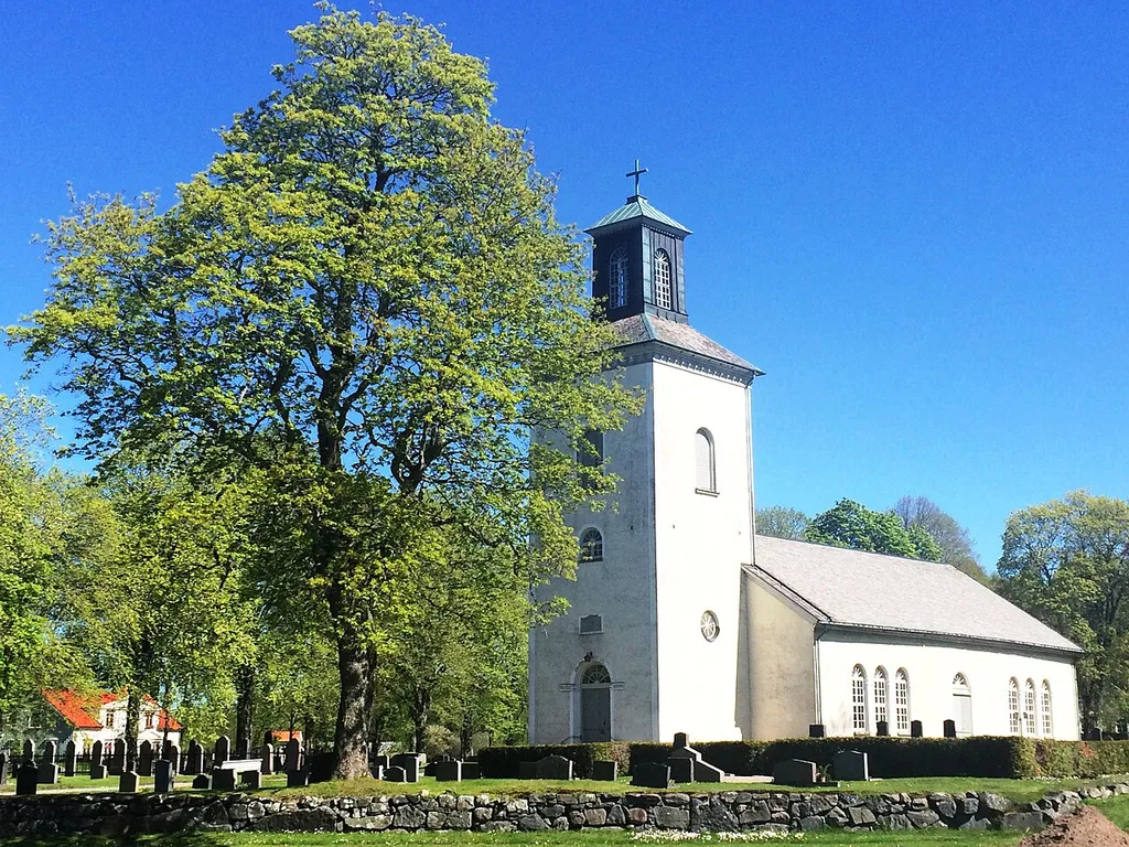 Sparlösa Church, by the Sparlösa Stone site, an old ritual place in Vara municipality, central Sweden.