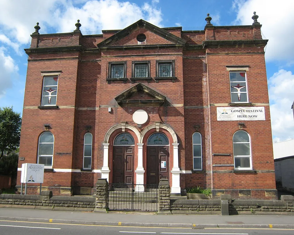 Leeds Central Seventh Day Adventist Church, 169 Meanwood Rd, Leeds LS7 1JW. Originally a Clowes Primitive Methodist Chapel (foundation stone 1893). Red brick. Front view