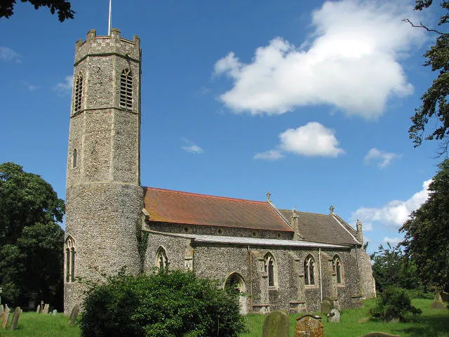 St George's Church, Rollesby, Great Yarmouth district, Norfolk. St George's church has a round tower with an octagonal upper section and dates mainly from the 14th century but there was an extensive restoration during the 19th century and there are not many older survivals > 855371 - 855388. The font > 855390 is C19, the east window is by Powell &amp; Sons (d. 1922). A C17 monument - to Rose Claxton, who died in 1601 - is located beside the high altar but only the tomb chest and effigy remain > 855385. The C17 monument to Leonard Mapes of Beeston (next Norwich), depicting the deceased with his wife and children, was executed in alabaster > 855380. A curious cubicle is located in the southeastern corner of the sanctuary; it has two entries and might have served as a sacristy > 855374. The church is kept locked but a key is available. For more information see: http://www.norfolkchurches.co.uk/rollesby/rollesby.htm