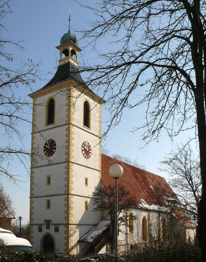 View of the Peter- und Pauls-Kirche (Saints Peter and Paul church) in Köngen, Baden-Württemberg, Germany, seen from the southwest in the light of a winter morning. Image slightly edited.