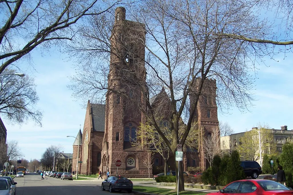 St. Paul's Episcopal Church (Rectory and Chapel) in the Yankee Hill neighborhood of Milwaukee, Wisconsin, was designed by E. Townsend Mix and constructed between 1882 and 1890 at a cost of $160,000 ($150,000 for the chapel, $10,000 for the steeple). Noted for its large collection of Tiffany stained glass, it was added to the National Register of Historic Places in 1974. This photo copyright © 2005 by Sulfur