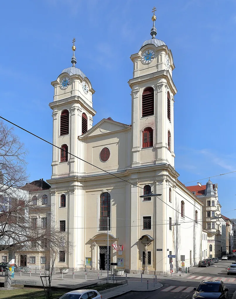 Die röm.-kath. Lichtentaler Pfarrkirche, auch als Schubertkirche bezeichnet, im 9. Wiener Gemeindebezirk Alsergrund.Die Grundsteinlegung der barocken Kirche fand durch Kaiser Karl VI. 1712 statt und am 25.September 1714 wurde darin die erste Hl. Messe gefeiert, jedoch erst 1730 geweiht. Von 1769 bis 1773 wurde die Kirche vergrößert, wobei die Fertigstellung des Nordturmes erst 1830 erfolgte.