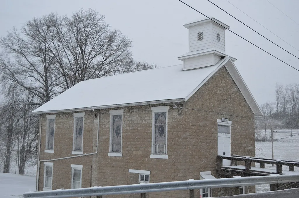 Front and western side of the Warner Community Church, located on State Route 821 in Warner, Ohio, United States.