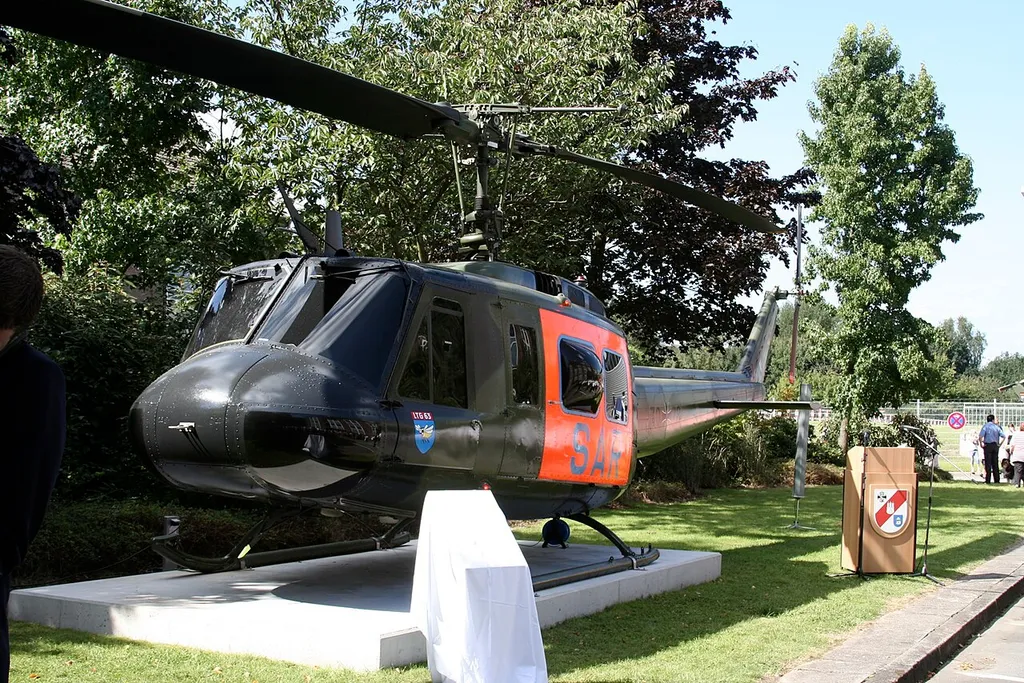 Monument of a Bell UH-1D helicopter honoring the decades-lasting participation of the German Armed Forces in Hamburg's pre-hospital air ambulance care. Located at the military hospital; taken on Aug/30, 2008, just prior to the inauguration.