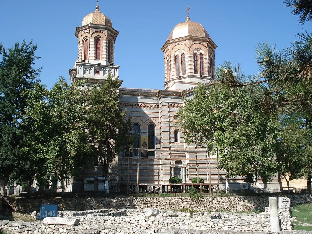 Holy Apostles Peter and Paul Romanian Orthodox Episcopal cathedral in Constanta, built in 1883-1885 by Ion Mincu. In the foreground, ruins of the ancient city of Tomis