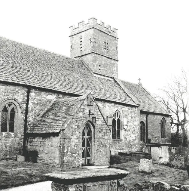 Chancel (right), east tower and south porch of St Michael and all Angels parish church, Brimpsfield, Gloucestershire, seen from the southwest