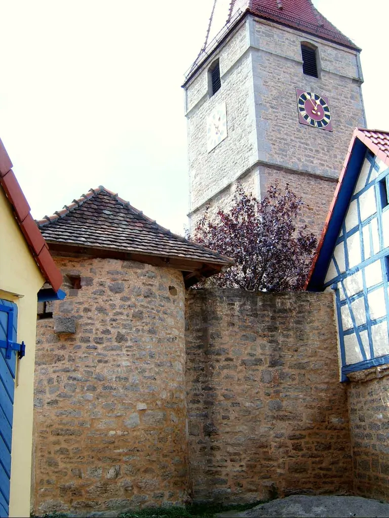 Finsterlohr (Church-Castle); District of Main-Tauber; Federal State of Baden-Württemberg; Germany Build in the 14th century; later changes; of special interest: In the North remnant of the curtain; rounded tower with loopholes at the Northeast corner