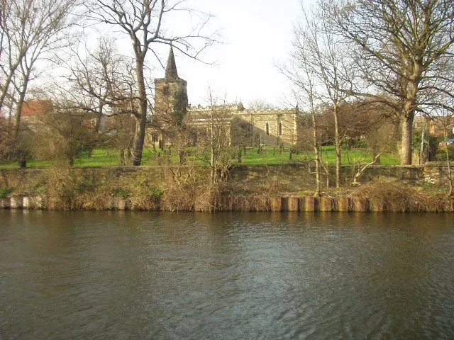 St John the Baptist's parish church, Mexborough, South Yorkshire, seen from the south from the opposite bank of the South Yorkshire Navigation