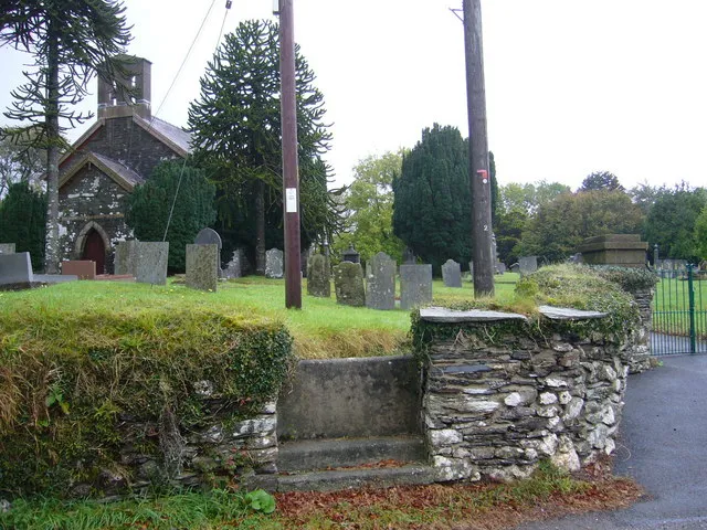 Church of St Gwinio. An Anglican church with a stile as well as gate. See also 573723.