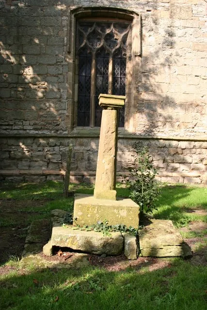 Churchyard monument in St Mary's parish churchyard, Egmanton, Nottinghamshire. The inscription reads "ROBT DOWT ENO HIL 1692"
