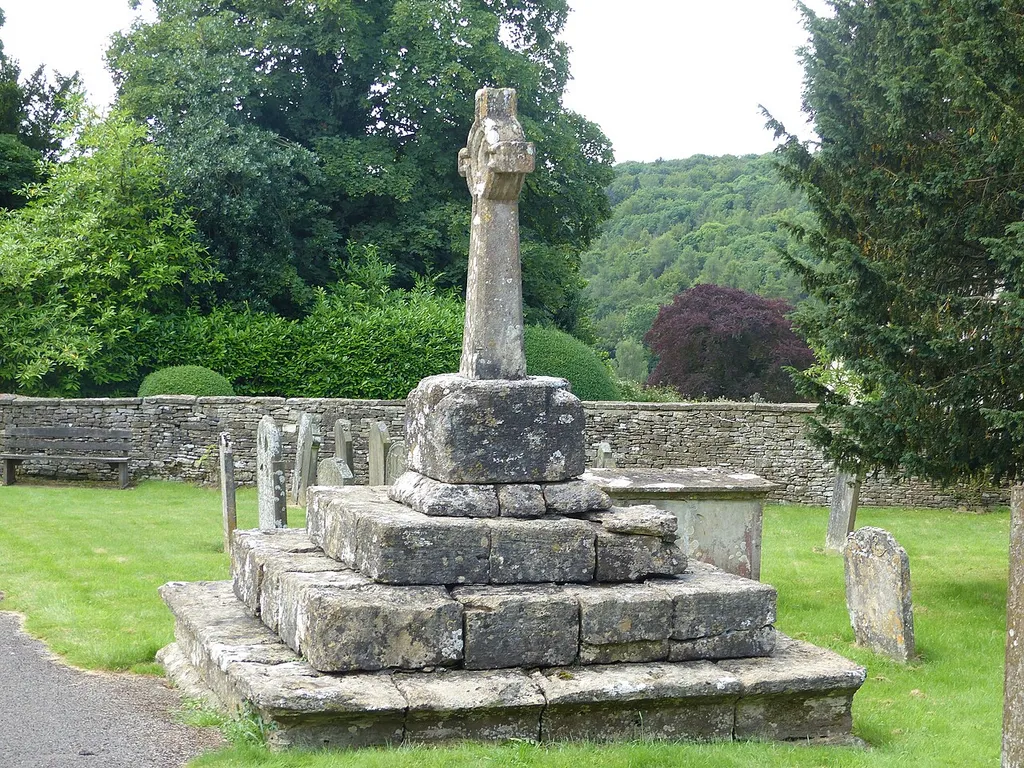 Churchyard cross in St Peter's churchyard: Grade II listed building in Rendcomb, Gloucestershire, UK. .mw-parser-output .messagebox{margin:4px 0;width:auto;border-collapse:collapse;border:2px solid var(--border-color-progressive,#6485d1);background-color:var(--background-color-neutral-subtle,#fbfcff);color:var(--color-base,#202122);box-sizing:border-box;border-inline-start-width:8px}.mw-parser-output .messagebox.mbox-small{font-size:88%;line-height:1.25em}.mw-parser-output .mbox-warning,.mw-parser-output .mbox-speedy{border:2px solid var(--border-color-error,#b22222);background:var(--background-color-error-subtle,#ffdbdb);border-inline-start-width:8px}.mw-parser-output .mbox-serious,.mw-parser-output .mbox-delete,.mw-parser-output .mbox-stop{border:2px solid var(--border-color-error,#b22222);border-inline-start-width:8px}.mw-parser-output .mbox-issue,.mw-parser-output .mbox-content{border:2px solid #f28500;background:var(--background-color-warning-subtle,#ffe);border-inline-start-width:8px}.mw-parser-output .mbox-query,.mw-parser-output .mbox-style{border:2px solid #f4c430;background:var(--background-color-warning-subtle,#ffe);border-inline-start-width:8px}.mw-parser-output .mbox-shit{border:2px solid #960;border-inline-start-width:8px}.mw-parser-output .mbox-license{border:2px solid #88a;border-inline-start-width:initial}.mw-parser-output .mbox-legal{border:2px solid var(--border-color-notice,#666);background:var(--background-color-base,#fff);border-inline-start-width:8px}.mw-parser-output .mbox-honor{border:2px solid #ca3;background:var(--background-color-warning-subtle,#fcf4db);border-inline-start-width:8px}.mw-parser-output .mbox-growth{border:2px solid #8d4;background:var(--background-color-success-subtle,#d5fdf4);border-inline-start-width:8px}.mw-parser-output .mbox-move{border:2px solid #93c;border-inline-start-width:8px}.mw-parser-output .mbox-protection,.mw-parser-output .mbox-message{border:2px solid var(--border-color-base,#aaa);border-inline-start-width: