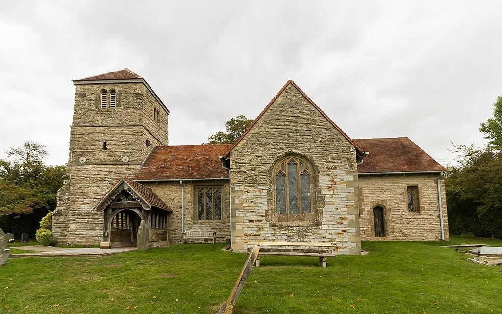 There is mention of a church in 1288, probably connected to Worcester Cathedral. The present church dates from the fifteenth century and consists of a western tower, nave and transepts, chancel, and south porch. It is built in mostly a perpendicular style. The west tower dates from the seventeenth century, and is of three stages. There are three bells, but presently can only be chimed due to the condition of the frames. The nave dates from the fifteenth century, and the chancel and south porch were rebuilt circa 1860. The chancel has some reset fifteenth century fabric, and a stained-glass window with reset fifteenth century glass. The altar rail is from the seventeenth century, as are parts of the oak pews. The octagonal font is recut, from the fifteenth century and decorated with roses and fetterlocks. In 1850 the church was in a poor state, with split walls and broken windows. It was restored in the mid nineteenth century by Hussey. Pic by Jenny.