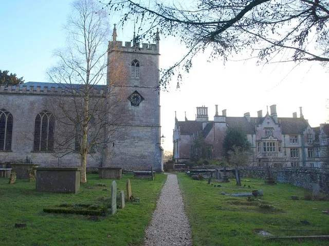 Church and school, Alderley. On the left is St. Kenelm's church, with a mid-C15 tower https://historicengland.org.uk/listing/the-list/list-entry/1152561 . On the right is 311944, dating from 1860 https://historicengland.org.uk/listing/the-list/list-entry/1340687 .
