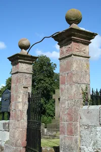 Gatepiers, gates and churchyard walls to west of church of St Mary