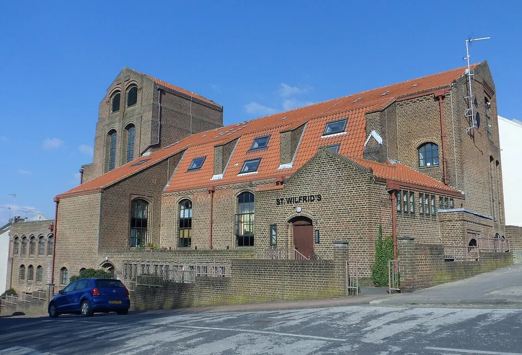 The former St Wilfrid's Church, Whippingham Road/Elm Grove junction, Brighton, City of Brighton and Hove, England. Built in 1932–34 to the design of Harry Stuart Goodhart-Rendel; listed at Grade II, but now converted into sheltered housing with the name St Wilfrid's Court.