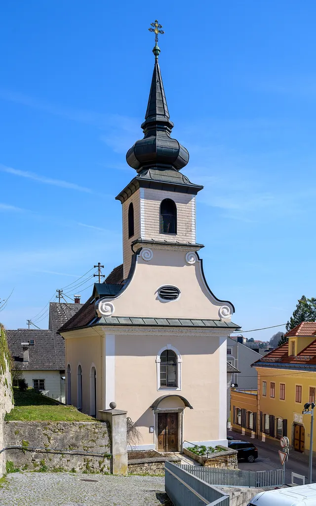 The Catholic branch church of St. Johannes in Kremsmünster is located below the mighty complex of the Kremsmünster Abbey.