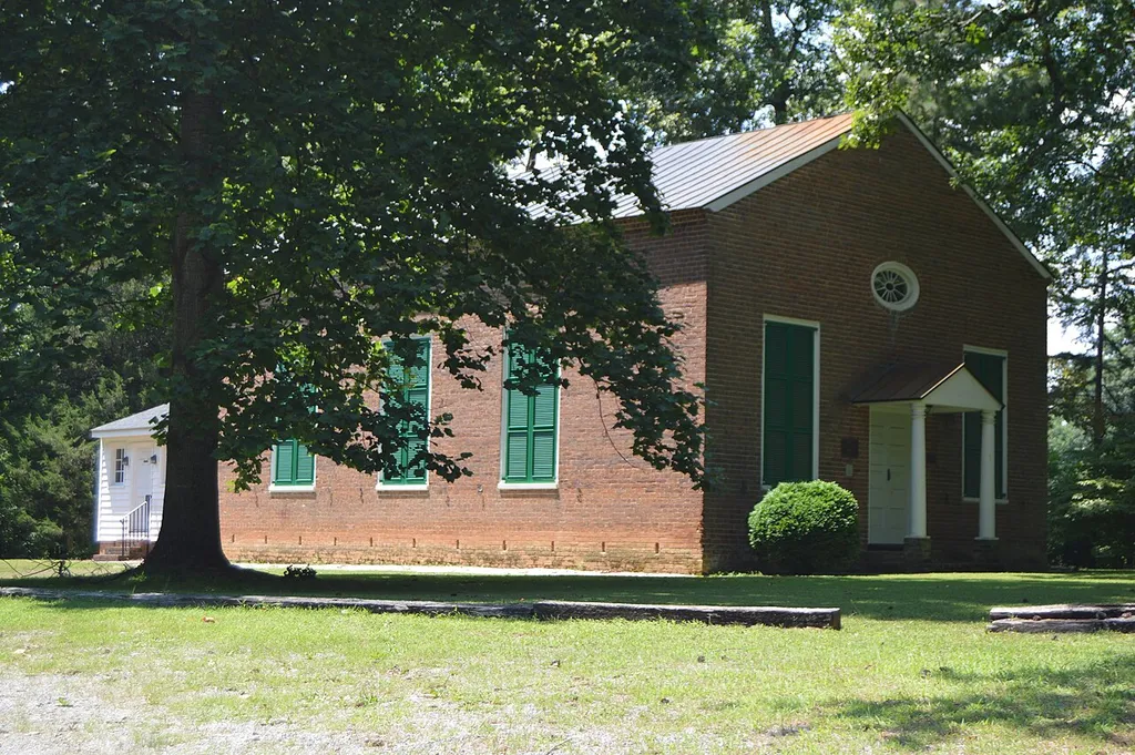 Front and eastern side of Trinity Episcopal Church, located on Goshen Road at Teman Road, south of Beaverdam, in Hanover County, Virginia, United States. Built in 1830, it is listed on the National Register of Historic Places.