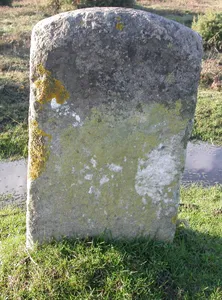 Milestone, Durns Town; 100m N of forest boundary (cattle grid) and 50m S of railway bridge