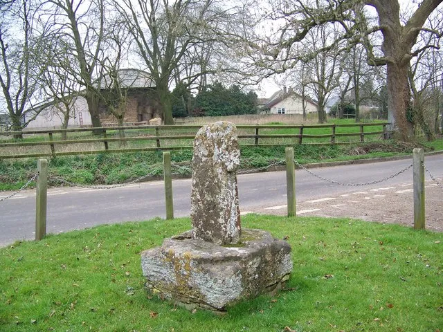 Base and broken shaft of stone cross in Hammoon, Dorset