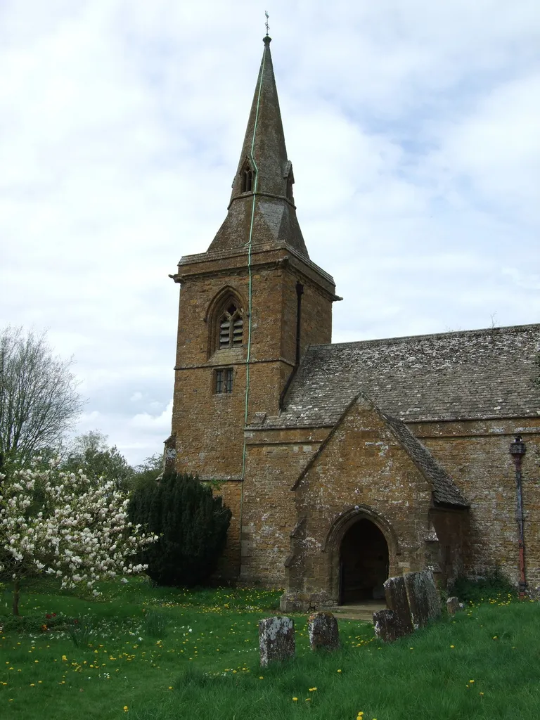 West tower and spire and south porch of St Botolph's parish church, Farnborough, Warwickshire