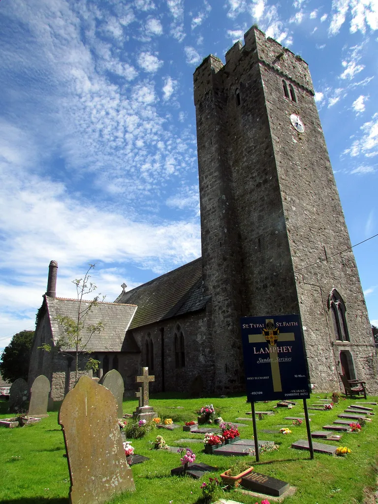 St Tyfai and St Faith Church church in Lamphey. The church has repositioned fragments of C13 architectural detail in the chancel - a piscina and two lancet windows, and there is early masonry surviving at the bases of walls, particularly the N transept. At the W end is a C14/C15 tower. In the C19 the church underwent extensive restoration to the point of rebuilding,