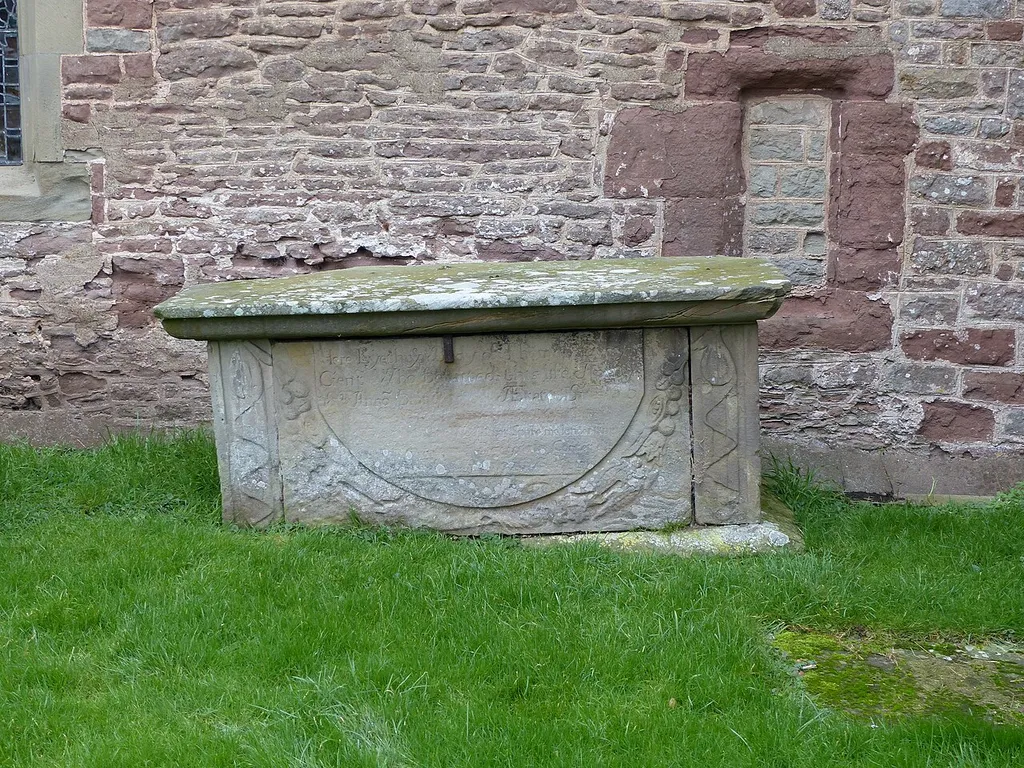 Grade II listed chest tomb in Goodrich, Herefordshire. Listed as "Tovey Monument approximately 0.25 metres from south wall of nave of Church of St Giles". .mw-parser-output .messagebox{margin:4px 0;width:auto;border-collapse:collapse;border:2px solid var(--border-color-progressive,#6485d1);background-color:var(--background-color-neutral-subtle,#fbfcff);color:var(--color-base,#202122);box-sizing:border-box;border-inline-start-width:8px}.mw-parser-output .messagebox.mbox-small{font-size:88%;line-height:1.25em}.mw-parser-output .mbox-warning,.mw-parser-output .mbox-speedy{border:2px solid var(--border-color-error,#b22222);background:var(--background-color-error-subtle,#ffdbdb);border-inline-start-width:8px}.mw-parser-output .mbox-serious,.mw-parser-output .mbox-delete,.mw-parser-output .mbox-stop{border:2px solid var(--border-color-error,#b22222);border-inline-start-width:8px}.mw-parser-output .mbox-issue,.mw-parser-output .mbox-content{border:2px solid #f28500;background:var(--background-color-warning-subtle,#ffe);border-inline-start-width:8px}.mw-parser-output .mbox-query,.mw-parser-output .mbox-style{border:2px solid #f4c430;background:var(--background-color-warning-subtle,#ffe);border-inline-start-width:8px}.mw-parser-output .mbox-shit{border:2px solid #960;border-inline-start-width:8px}.mw-parser-output .mbox-license{border:2px solid #88a;border-inline-start-width:initial}.mw-parser-output .mbox-legal{border:2px solid var(--border-color-notice,#666);background:var(--background-color-base,#fff);border-inline-start-width:8px}.mw-parser-output .mbox-honor{border:2px solid #ca3;background:var(--background-color-warning-subtle,#fcf4db);border-inline-start-width:8px}.mw-parser-output .mbox-growth{border:2px solid #8d4;background:var(--background-color-success-subtle,#d5fdf4);border-inline-start-width:8px}.mw-parser-output .mbox-move{border:2px solid #93c;border-inline-start-width:8px}.mw-parser-output .mbox-protection,.mw-parser-output .mbox-message{border:2px solid var