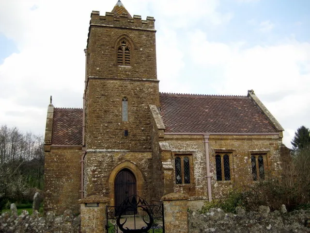 The Church of St Giles Hooke The windows of this little church are 16th Century but the tower was rebuilt by Crickmay, an architect from Weymouth. (Crickmay took over John Hicks' architectural business in Dorchester when he died in 1869 and Thomas Hardy, Hicks' apprentice, came to work for Crickmay for a few months. This was well before the work on this church was started.)