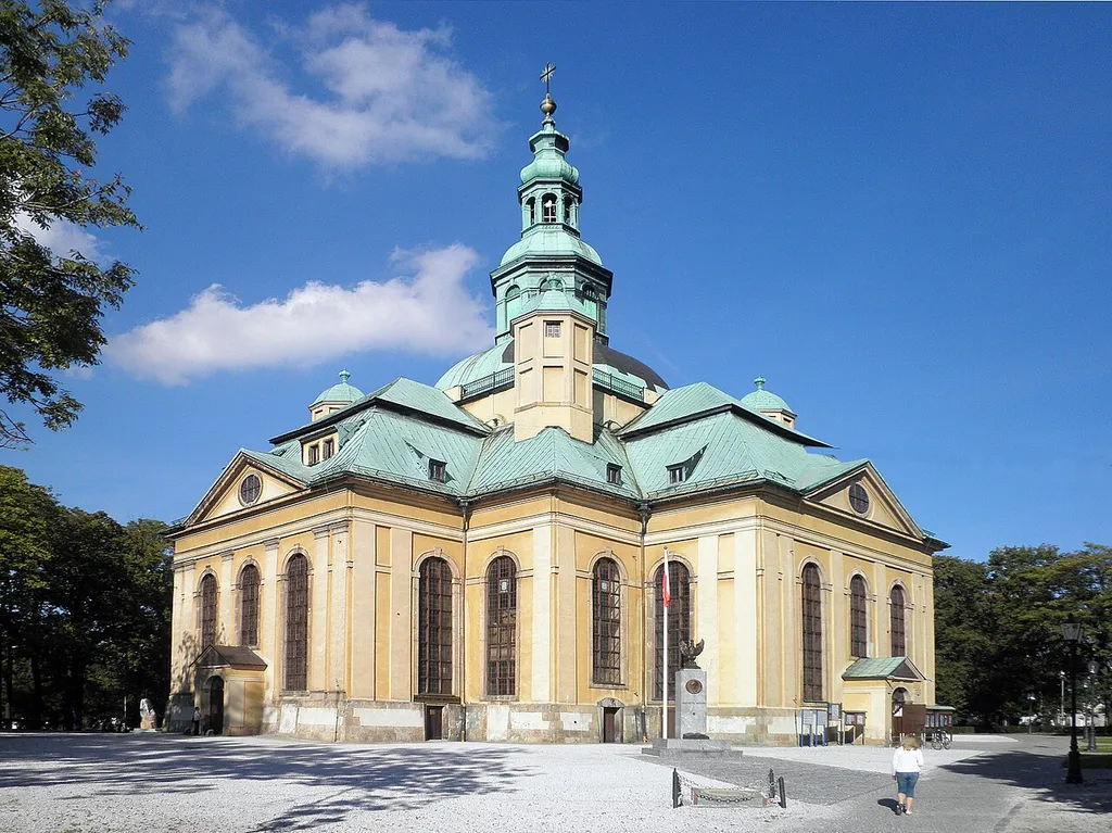 zespół kościoła ewangelickiego, ob. rzym.-kat. pw. Świętego Krzyża, 1709-1718:- d. ewangelicki kościół Łaski, ob. kościół garnizonowy ul. 1-go Maja 45, Miasto Jelenia Góra