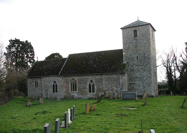 The church of St John the Evangelist. The church of St John the Evangelist was built in the 13th /14th century but has been much restored since; the furniture dates mainly from the mid 19th century. The unusual and interesting font, which once stood in the church of St Mary in Watton, dates from the 14th century and the panelling and reredos > 706497 on the east wall are fashioned from the medieval rood screen. There is an old stained glass roundel in one of the north wall windows > 706506. A small lancet window in the south wall is executed in the Arts and Craft style > 706513. For more information see: http://www.norfolkchurches.co.uk/ovington/ovington.htm