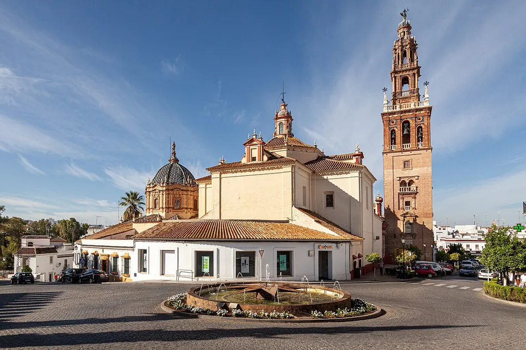 The Iglesia de San Pedro is in Carmona, Spain where we visited on a day trip from Seville. The 15th-century Iglesia de San Pedro has a rich baroque interior and a tower modeled on Seville's Giralda tower.