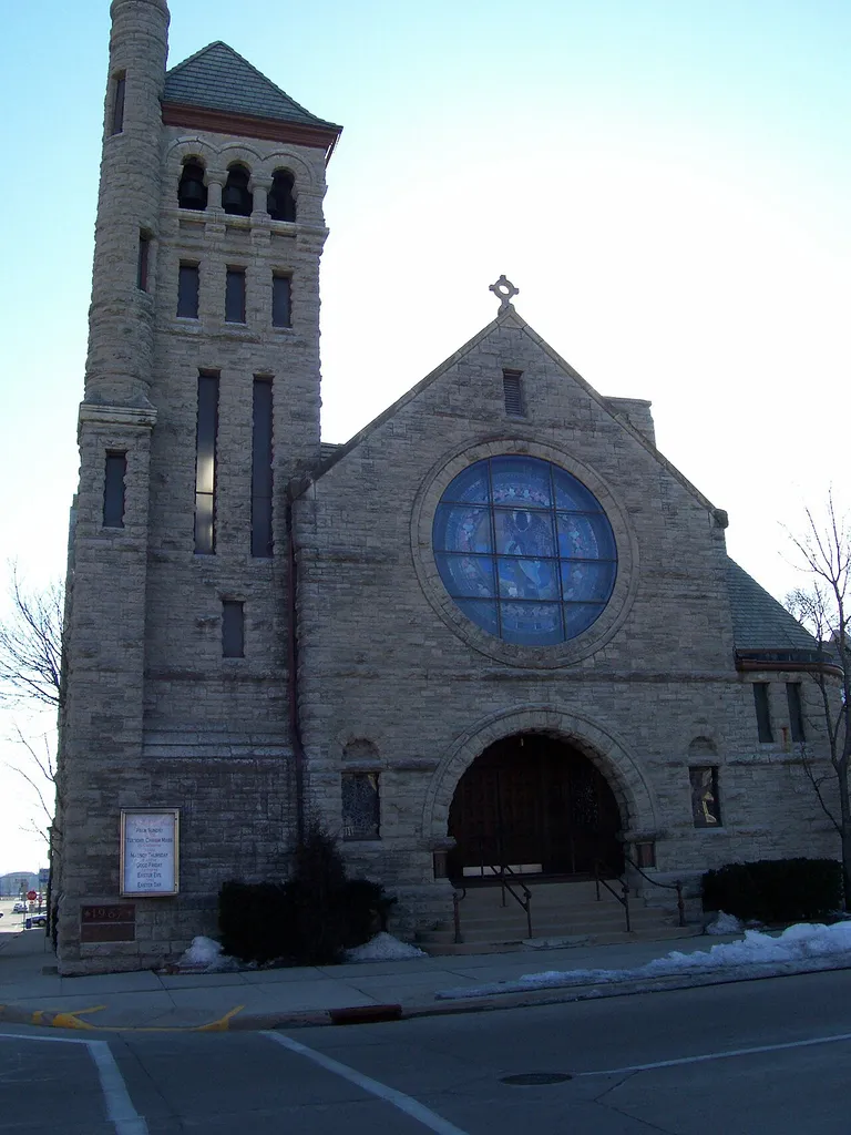 Looking at the front of the w:Trinity Episcopal Church (Oshkosh, Wisconsin) in downtown w:Oshkosh, Wisconsin. It is listed on the National Register of Historic Places.
