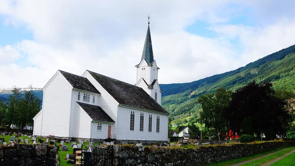The church of Vik (Vik i Sogn) and its cemetery viewed from behind