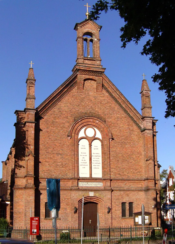 Street view of the Lutheran church building at Fuerstenwalde (Spree), Germany. The building has been completed in 1883. It is an officially recognized landmark of Fuerstenwalde.