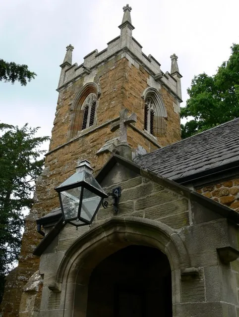 South porch gable and west tower of All Saints' parish church, Keyham, Leicestershire, seen from the southeast