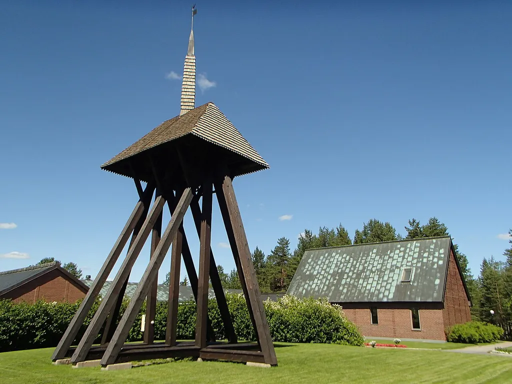 The belfry and church building of "Obbola kyrka" at Södra obbolavägen 34, Obbola, Umeå Municipality, viewed from south