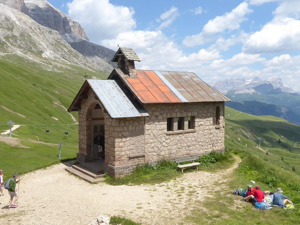The little church of Our Lady of Defense on the Pordoi Pass (Dolomites, Italy)
