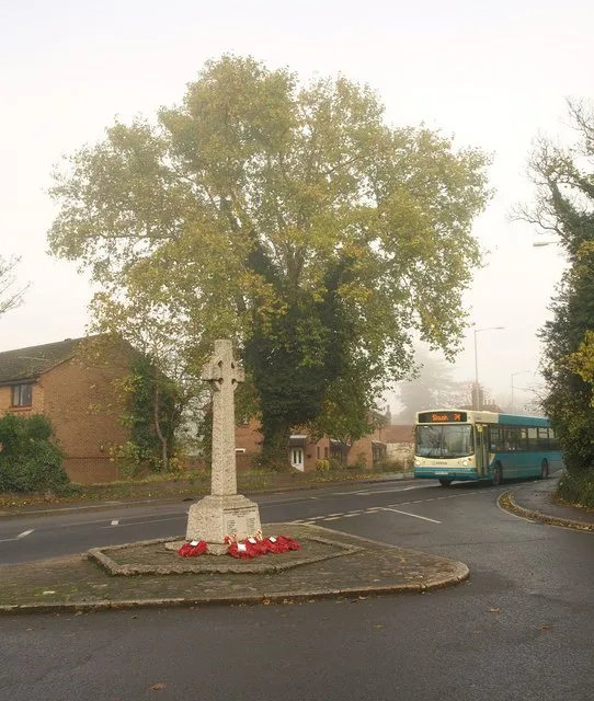 War memorial, Farnham Royal, Data from Geograph: Description: On a foggy day. The memorial stands at the unction of Church Road (foreground) with the A355 Farnham Road, down which the Arriva 74 bus service is heading towards Slough from High Wycombe. ICBM: 51.536315877923, -0.61770462340597 Location: (about 0 km from) near to Farnham Royal, Buckinghamshire, Great Britain.