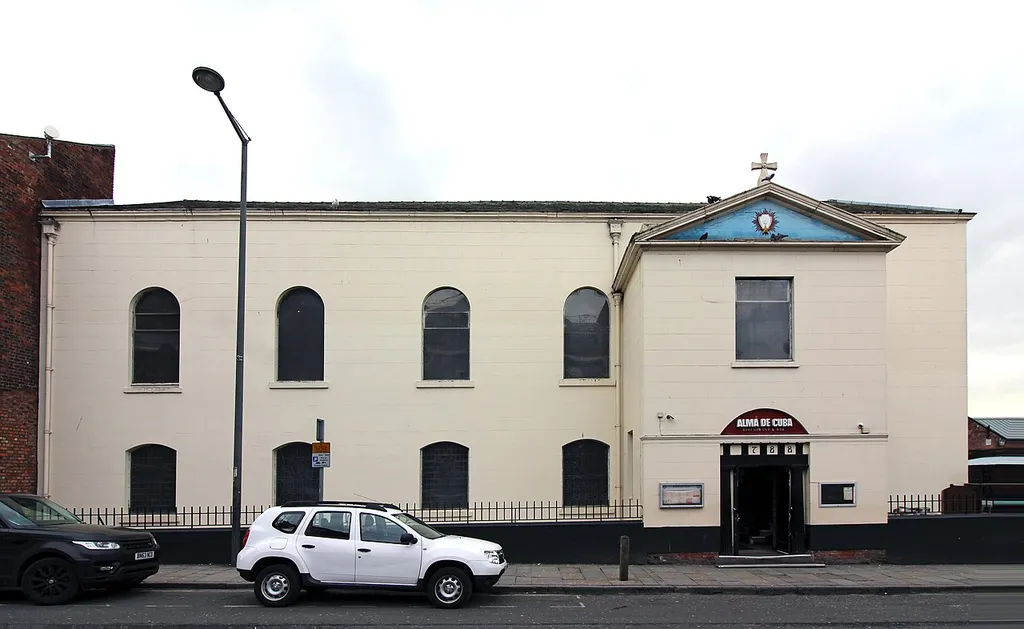 North side, on Seel Street. St Peter's was the oldest Catholic church in Liverpool and is Grade II listed. Now converted into a restaurant and bar, Alma de Cuba, it retains many original features, especially stained glass and sanctuary.