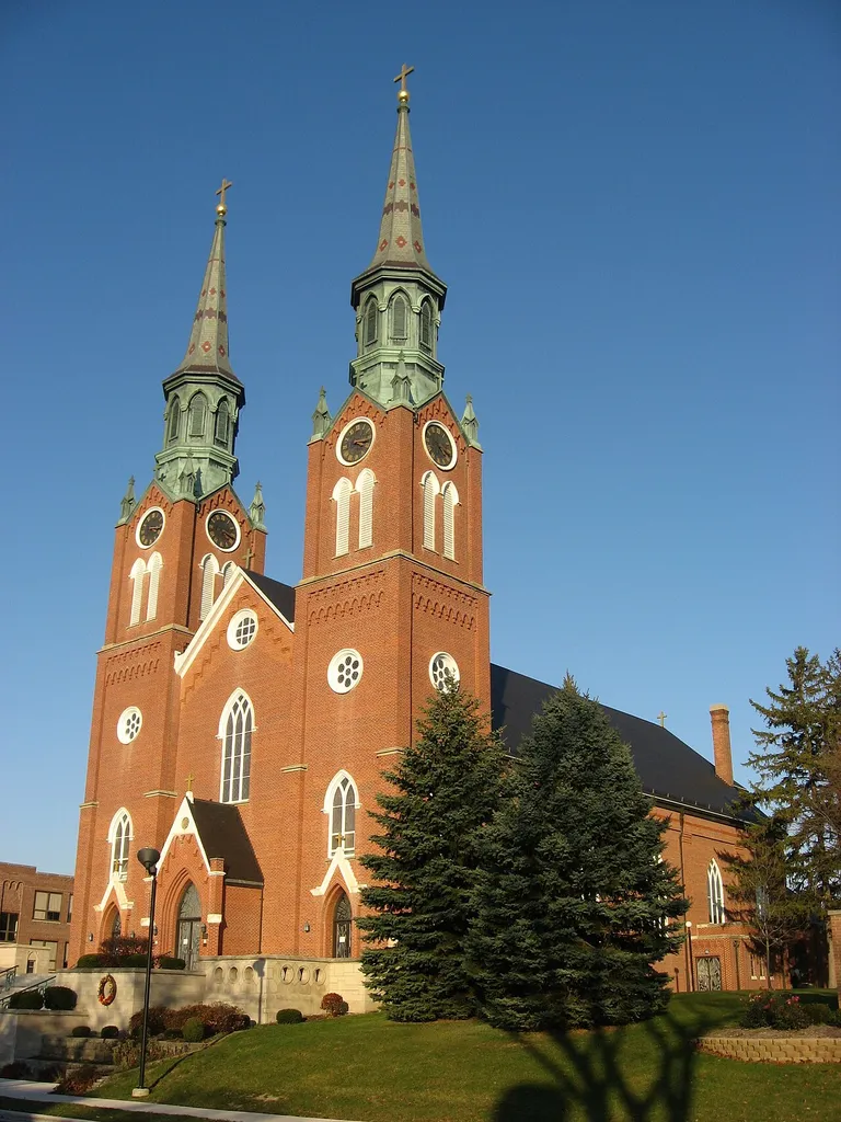 Front and southern side of St. Augustine's Catholic Church, located on N. Hanover Street in Minster, Ohio, United States. Built in 1848, the church was listed on the National Register of Historic Places as a part of the Cross-Tipped Churches of Ohio Thematic Resources. Church website.