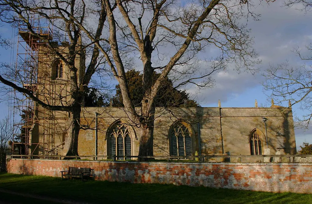 Church of St Mary, Preston on Stour The south side of the church. The tower is undergoing some restoration work as evidenced by the scaffolding.