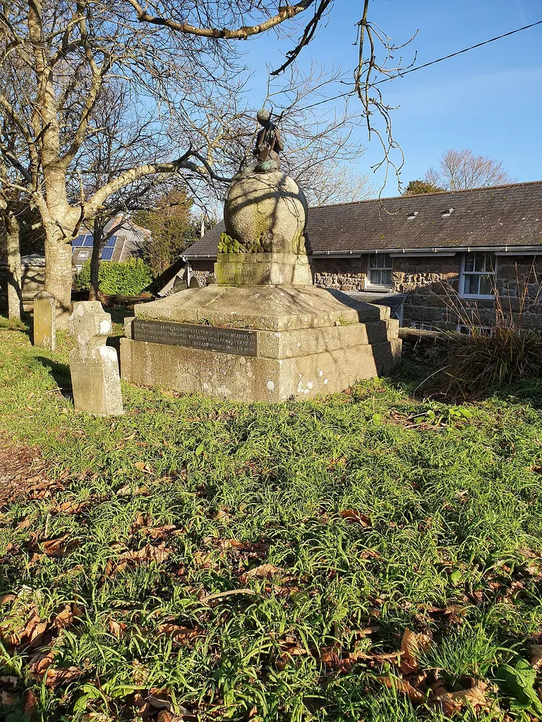 Grade II listed Armstrong monument in Madron churchyard. The incription on the slate reads - "The Monument above has been erected in loving memory of John Scobell Armstrong who was born at Nancealverne 1st August 1842 who died 6th May 1929 and whose ashes lie here". This is a photo of listed building number 1312445.