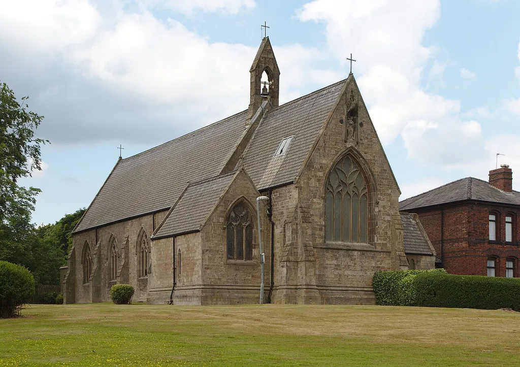 (Liturgical) south side and west end of St Mary Immaculate from the adjacent field