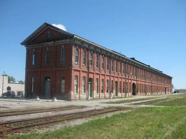 This is the restored Canada Southern Railway Station in St. Thomas, Ontario, Canada, taken August 2013. The angle is the southwest corner of the building. The building, built 1873, is now owned by the North America Railway Hall of Fame.